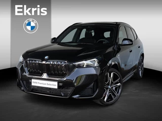 BMW iX1 eDrive20 | M Sportpakket Pro | Premium Pack | Travel Pack | Verwarmd Stuurwiel | Comfort Access | Achteruitrijcamera | Panoramadak | Stoelverwarming | Harman-Kardon