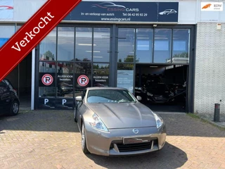 Hoofdafbeelding Nissan 370Z Nissan 370Z 3.7 V6 UNIEK NAP CUSTOM UITLAAT NL auto!
