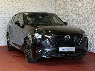 Hoofdafbeelding Mazda CX-60 Mazda CX-60 2.5 e-SkyActiv PHEV HOMURA ELEK.STOEL STOEL/STUUR.VERW/VENTILATIE HEADUP AWD 4X4 4WD ✅ Top Auto's Wijchen. Al 30 Jaar verkoop van Mazda , Alle Modellen PHEV / HEV / BENZINE✅