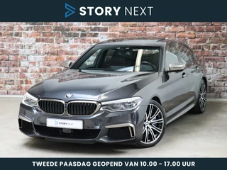 BMW 5 Serie Sedan M550i xDrive High Executive M Sport Pakket Automaat / Night Vision / Trekhaak / Schuif-/kanteldak / Bowers & Wilkins / Head-Up Display / Stoelventilatie / Soft Close / Driving Assistant Plus / Massage Stoelen / Comfort Access / Stoelverwarming Achter / Surround View / Nappa Leder / 21 Inch