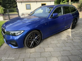 Hoofdafbeelding BMW 3 Serie BMW 3-serie Touring 330e High Executive M-SPORT 2021