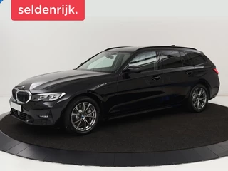 BMW 3-serie 330e Sport Line | Stoel & stuurverwarming |  Adaptive cruise | Trekhaak | Sportstoelen | Carplay | Sfeerverlichting | Half leder | Navigatie | Full LED | PHEV