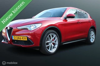 Alfa Romeo Stelvio 2.0 T AWD 281 PK First Edition, Rosso Competizione, Panoramadak, F1 Schakeling, Navi, Donker glas, Pdc voor + achter + camera, Stoel- Stuurverwarming,20 Inch LMV