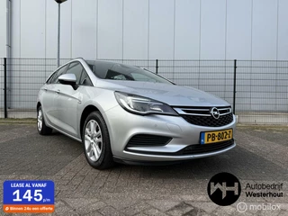 Hoofdafbeelding Opel Astra Opel Astra Sports Tourer 1.0 Online Edition NAVI NAP Camera