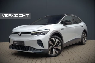 Hoofdafbeelding Volkswagen ID.4 Volkswagen ID.4 First 77 kWh | Stoelverwarming | Stuurverwarming | Trekhaak | Adaptive Cruise Control | Navigatie | Apple Carplay | Keyless | Camera | Parkeersensoren | NAP | BTW | Dealer Onderhouden