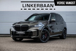 BMW X5 xDrive50e Hybride | Uniek | M Sport | Pano | H&K | Massage | Trekhaak | 22 inch | NL auto |