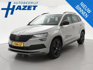 Hoofdafbeelding Škoda Karoq Skoda Karoq 1.5 TSI ACT 150 PK DSG AUT. SPORTLINE STEEL GREY + VIRTUAL COCKPIT | TREKHAAK | CAMERA | ADAPTIVE CRUISE