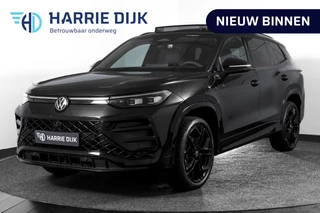Hoofdafbeelding Volkswagen Tayron Volkswagen Tayron 1.5 eHybrid R-Line Edition | Black Style | 15 inch Navi | Elek. Trekhaak | IQ Light | HUD | S/K-Panodak | Dig. Cockpit | Adapt. Cruise | Stoel-+Stuurverw. | 360 Camera | NAV + App. Connect | ECC | Elek. Klep | LM 20" | 9294