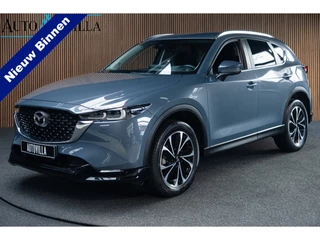 Mazda CX-5 2.0 e-SkyActiv-G M Hybrid 165 HUD Navi 360 ° PDC Stuur- & stoelverwarming Elektr. bedienbare achterklep Climate C. Cruise C. LM velgen Splinternieuw!