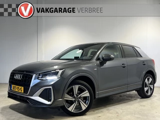 Audi Q2 35 TFSI S Edition | S-line | Navigatie/Android/Apple Carplay | LM Velgen 18" | Lederen/Stof Bekleding | Cruise Control | Achteruitrijcamera | Airco |