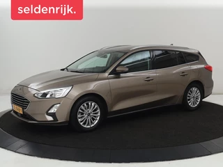 Ford Focus 1.0 EcoBoost Titanium | Stoelverwarming |  Trekhaak | Adaptive cruise | Carplay | Keyless | Navigatie | Parkeerhulp | Stuurverwarming | Climate control | Getint glas