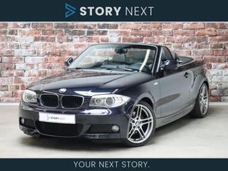 Hoofdafbeelding BMW 1 Serie BMW 1 Serie Cabrio 118i High Executive M Sport Pakket Automaat / Navigatie Professional / Leder / 18 Inch / Climate Control / Xenon / Stoelverwarming / Chrome Line / Parkeersensoren / Cruise Control / Winscherm / Bluetooth