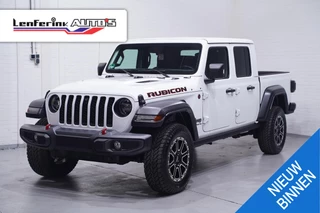 Hoofdafbeelding Jeep Gladiator Jeep Gladiator 3.6 V6 285 pk Rubicon Grijs Kenteken 2-Zits Navi Leder Zwart, Adapt. Cruise, Targa Dak, Trekhaak, Uniek