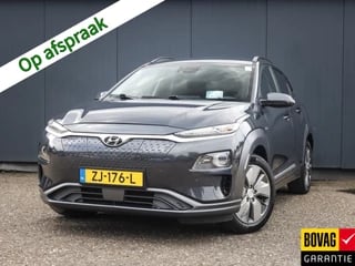 Hyundai Kona EV Premium 64 kWh 1e-Eig, Hyundai-Dealer-Onderh, 12-Mnd-BOVAG, NL-Auto, Warmtepomp, Navigatie/Apple-Carplay/Android-Auto, Adaptive-Cruisecontrol, Keyless-Entry/Start, Stoelverwarming-V+A, Parkeersensoren-V+A, DAB, Voorstoelen-Gevent, Lm-Velgen-17Inch, Privacy-Glas