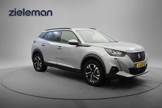 Peugeot e-2008 Allure Pack 50 kWh - Carplay, Digitaal Cockpit, Half Leer, Navi, Cruise, Camera, Stoelverw. Afn. Trekhaak