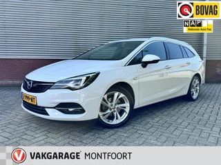 Hoofdafbeelding Opel Astra Opel Astra Sports Tourer 1.2 Blitz Elegance 21.000 km!|Navi|Cruise|Trkhaak|Camera||Elektrische achterklep|Dode hoekdtectie|Apple/Android Carplay|Comfortstoelen.