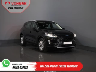 Ford Kuga 2.5 PHEV 225 pk Titanium Navi/ Carplay/ Stoelverw./ Stuurverw./ Camera/ PDC/ Climate