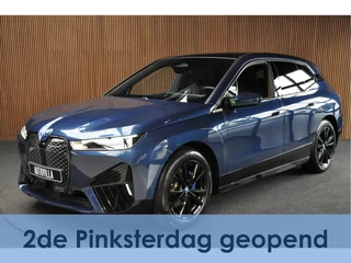 BMW iX xDrive40 77 kWh Panodak Sky Lounge Massage Leder 360 Harman K. Navi PDC 21" Stoelventilatie LM velgen