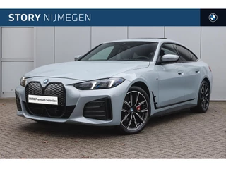 BMW i4 eDrive40 Gran Coupé M Sport / Schuif-kanteldak / Achteruitrijcamera / Adaptieve LED / Comfort Access / Active Cruise Control / Stuurverwarming