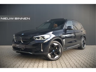 BMW iX3 High Executive 80 kWh | Panoramadak | Keyless | Stoelverwarming | Harman Kardon | Memory Seat | Head-Up Display | 360 Camera | Adaptief Onderstel | Trekhaak | Adaptive LED | Elektrische Stoelen | Apple Carplay | N