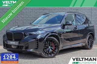 Hoofdafbeelding BMW X5 BMW X5 xDrive50e M-SPORT PANO TREKHAAK HARMAN KARDON 22INCH MEMORY