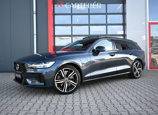 Volvo V60 2.0 T6 Recharge AWD R-Design | Pano | Leder | Memory | 360 | Stoelverwarming Voor&Achter | Stoelventilatie | Harmon Kardon | Stuurwielverwarming | Zwenkbare trekhaak | Carplay  | Ambient | Led | 19''  | ACC | Lane Assist | Keyless