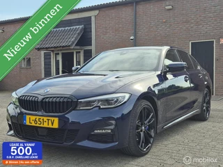 BMW 3-serie 320e Business Edition Plus I Adap Cruise I Camera I Head-up I M-Sport I Tansanitblau I