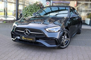 Hoofdafbeelding Mercedes-Benz C-Klasse Mercedes-Benz C-Klasse 300 e Business Solution AMG Panoramadak Memory stoelen Trekhaak