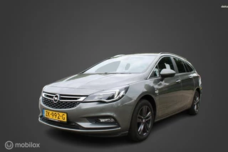 Hoofdafbeelding Opel Astra Opel Astra Sports Tourer 1.0 Turbo Business Executive, Parkeersensoren voor en achter, Navigatie, Apple Carplay/Android Auto, Cruise control