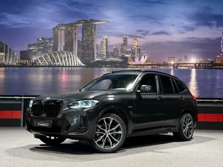 Hoofdafbeelding BMW X3 BMW X3 xDrive30e High Ex. Trekhaak|LASER|HUD|M-Sport|Panorama|Camera