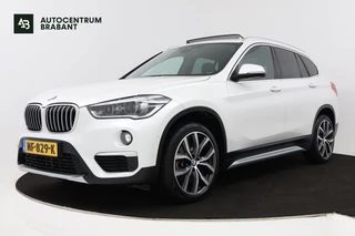 BMW X1 SDrive20i Centennial High Executive (PANORAMADAK, TREKHAAK, STOELVERWARMING, HEAD-UP DISPLAY, DEALER ONDERHOUDEN)