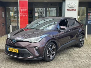 Hoofdafbeelding Toyota C-HR Toyota C-HR 1.8 HYBRID DYNAMIC APPLE/ANDROID STOELVERWARMING AD-CRUISE KEYLESS CAMERA PARK-SENSOREN LM-VELGEN