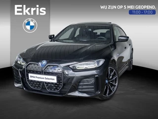 BMW i4 eDrive40 | M Sport | Stoelverwarming | Schuif-/kanteldak | Active Cruise Control | Parking Assistant Plus | 19''