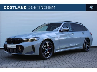 BMW 3 Serie Touring 320e High Executive M Sport Automaat / Panoramadak / Achteruitrijcamera / Sportstoelen / Stoelverwarming / LED / Live Cockpit Professional / Comfort Access