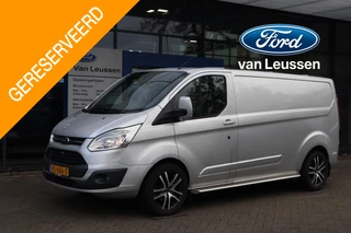 Ford Transit Custom 290 2.2 TDCI L2H1 LIMITED 3-PERSOONS TREKHAAK CAMERA P-SENSOREN STOELVERWARMING NAVI SIDEBARS LM-VELGEN BETIMMERD