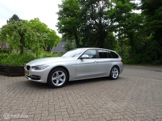 BMW 3-serie 318d High Executive Aut.Xenon.Clima.ElekTrekhaak.HeadUp