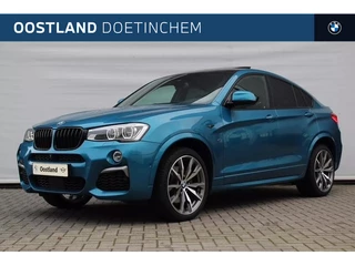 Hoofdafbeelding BMW X4 BMW X4 M40i High Executive M Sport Automaat / Schuif-kanteldak / Trekhaak / Sportstoelen / Comfort Access / Adaptieve LED / Head-Up / Harman Kardon / Stoelverwarming