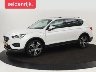 Hoofdafbeelding SEAT Tarraco SEAT Tarraco 1.4 TSI e-Hybrid PHEV Xcellence | Panoramadak |  Leder | Trekhaak | Stoel & achterbankverwarming | Adaptive cruise | Carplay | Camera | Digital Cockpit | Navigatie | Plug In