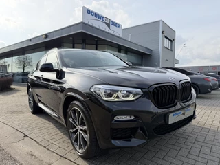 Hoofdafbeelding BMW X4 BMW X4 xDrive20i M-sport Pano-Dak | Trekhaak | Leer | Memory | HUD