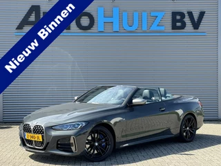 Hoofdafbeelding BMW 4 Serie BMW 4 Serie Cabrio M440i 374PK xDrive High Executive M Sport Nekverwarming 19 Inch DAB LED Stuurverwarming Harman-Kardon Stuurverwarming 360 graden Camera Head-Up Display Keyless Entry Laser Licht ACC Dravit Grau Carplay Vol!