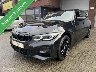 Hoofdafbeelding BMW 3 Serie BMW 3-serie Touring 330e xDrive High Executive PANO-DAK*LED*