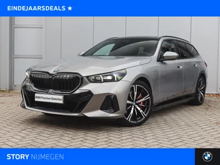 BMW 5 Serie Touring 550e xDrive M Sport Automaat / Panoramadak / Trekhaak / Adaptief onderstel professional / Stoelventilatie / Adaptieve LED / Parking Assistant Plus / Harman-Kardon