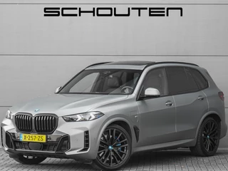 Hoofdafbeelding BMW X5 BMW X5 xDrive50e M-Sport Pro Driving Ass Pro Stoelvent H&K Iconic Glow Trekhaak Frozen 
