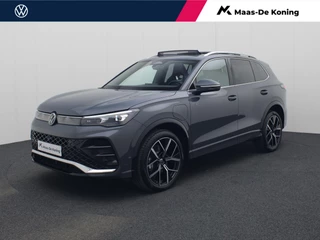 Hoofdafbeelding Volkswagen Tiguan Volkswagen Tiguan 1.5eHybrid 200kW/272PK R-Line DSG · Panoramadak · Trekhaak · Massagefunctie · Camera · Apple/Android Carplay ·  Garantie t/m 30-03-2030 of 100000km.