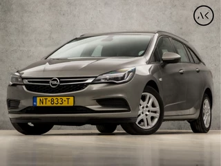 Hoofdafbeelding Opel Astra Opel Astra Sports Tourer 1.0 Online Edition (GROOT NAVI, APPLE CARPLAY, CAMERA, CRUISE, DAB+, ELEK PAKKET, ARMSTEUN, SPORTSTOELEN, PARKEERSENSOREN, NIEUWE APK, NIEUWSTAAT)