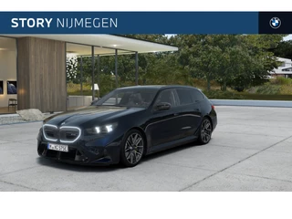 Hoofdafbeelding BMW M5 BMW M5 Touring Automaat / M Drive Professional / Panoramadak / Trekhaak / M Carbon-keramische remmen / M Multifunctionele Stoelen / Bowers & Wilkins