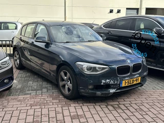 Hoofdafbeelding BMW 1 Serie BMW 1-serie 116i EDE Executive Navi Stuurwielbed. Mistlampen 16"L.M. Parkeersensoren