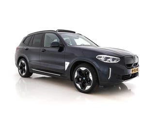 Hoofdafbeelding BMW iX3 BMW iX3 High Executive 80 kWh [3-Fase] (INCL-BTW) *PANO | VERNASCA-FULL-LEATHER | HEAD-UP | DIGI-COCKPIT | FULL-LED | BLIND-SPOT | HARMAN/KARDON-AUDIO | SURROUND-VIEW | KEYLESS | DAB+ | MEMORY-PACK | TOWBAR | SPORTSEATS | 20''ALU*