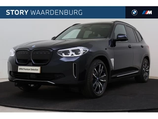 Hoofdafbeelding BMW iX3 BMW iX3 High Executive / Trekhaak / Sportstoelen / Comfort Access / Head-Up / Parking Assistant Plus / Gesture Control / Adaptief onderstel