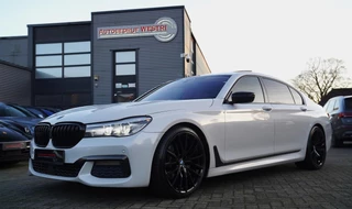 BMW 7-serie 740Li High Executive | Panorama | Harman/Kardon | Adaptieve cruise | HuD | LED | Parelmoer wit | M-pakket | 20 inch |